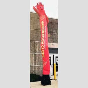 Red waving inflatable tube figure.