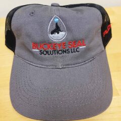 Gray baseball cap with Buckeye Seal Solutions logo emroidered on it.